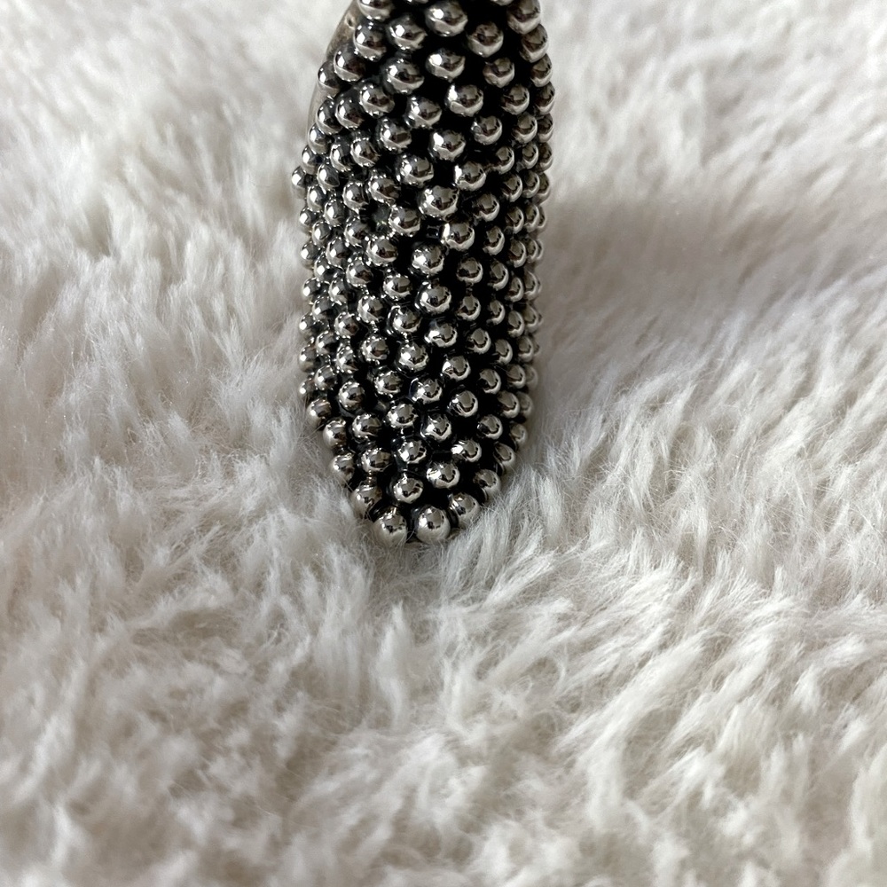 Size 8 .925 sterling silver curved dotted/drop/teardrop ring